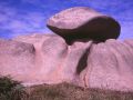 round eroded stone coast rock